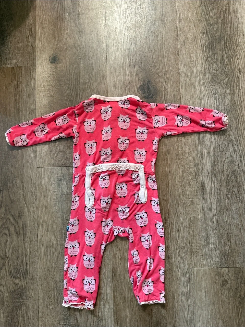 KicKee Pants baby footie features a pink Wise Owl print and a ruffled zipper dow